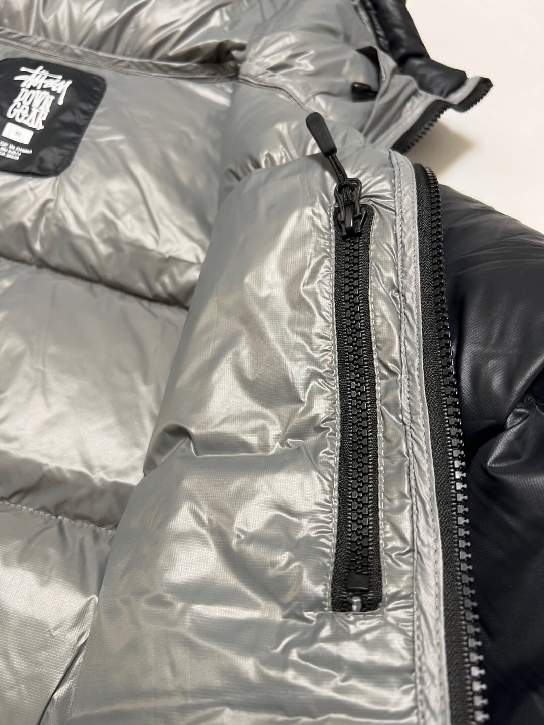 P879  Stussy down jacket · image 18