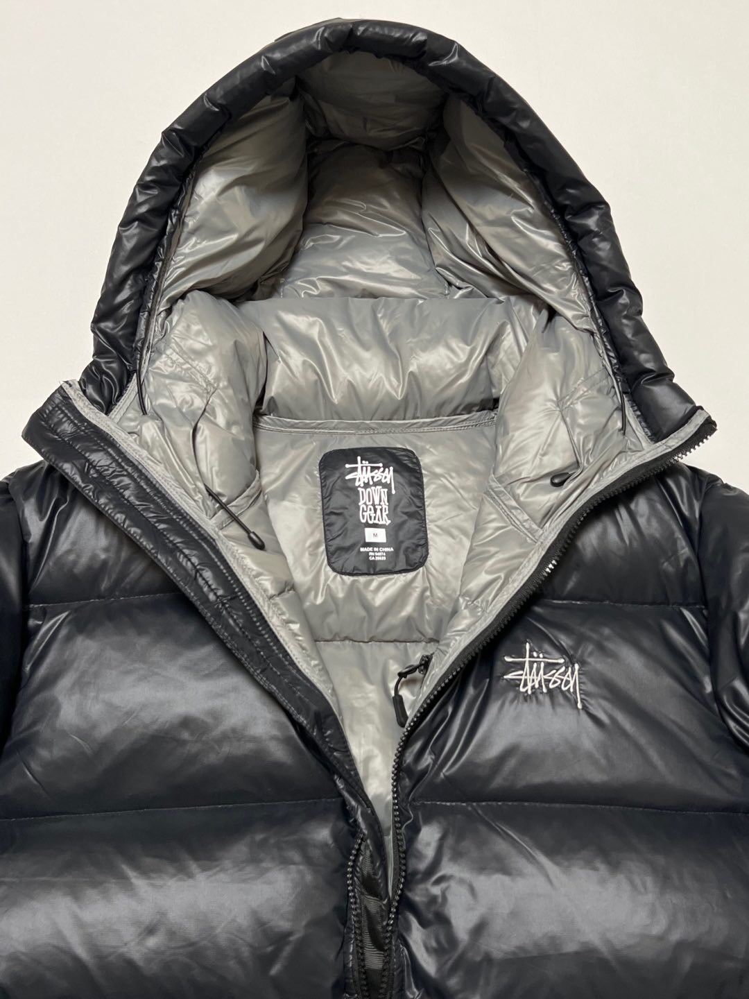 P879  Stussy down jacket · image 8